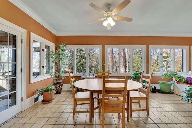 sunroom / solarium with ceiling fan