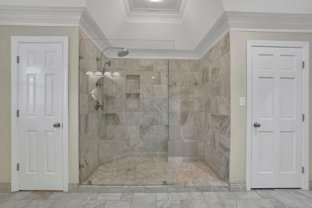 bathroom with an enclosed shower and crown molding