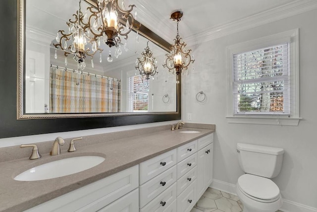 bathroom with vanity, toilet, crown molding, and a notable chandelier