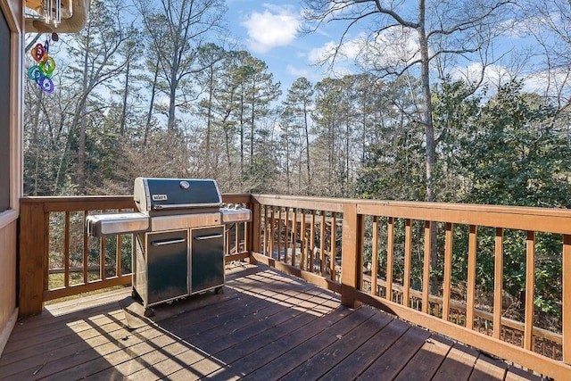 wooden deck with area for grilling