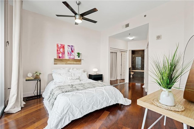 bedroom with hardwood / wood-style floors and ceiling fan