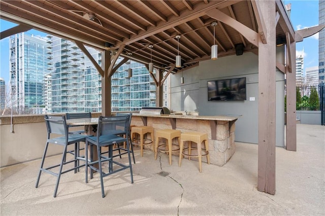 view of patio / terrace featuring exterior bar