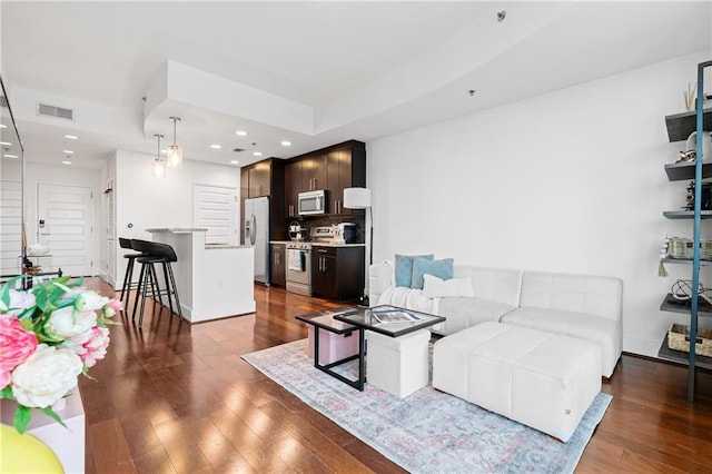 living room with dark wood-type flooring