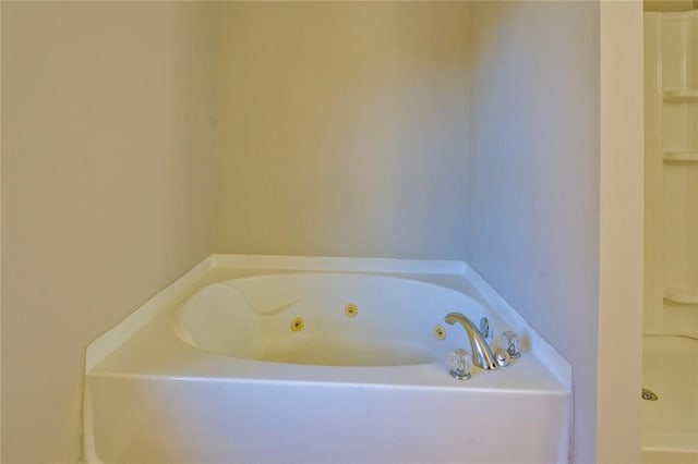 bathroom featuring a tub to relax in