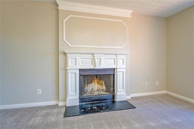 interior details with carpet flooring and a textured ceiling