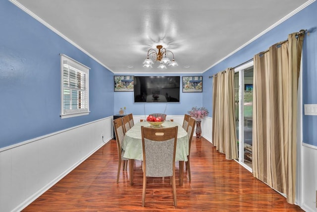 2648 Oswood Dr, Tucker, GA 30084 - dining room featuring ornamental molding, a chandelier, and wood finished floors