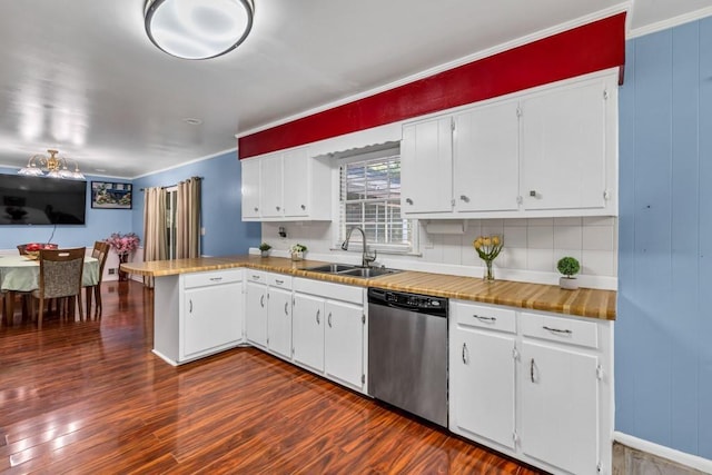 2648 Oswood Dr, Tucker, GA 30084 - kitchen featuring dishwasher, a sink, a peninsula, dark wood finished floors, and white cabinetry