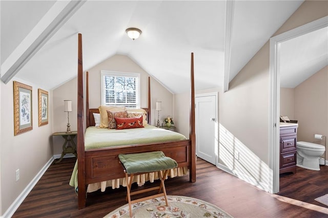 bedroom with vaulted ceiling, dark wood-type flooring, and baseboards