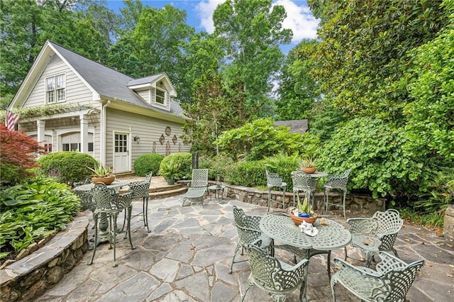 view of patio / terrace with an outdoor structure