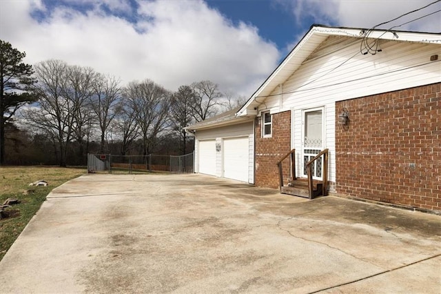 view of property exterior with a garage