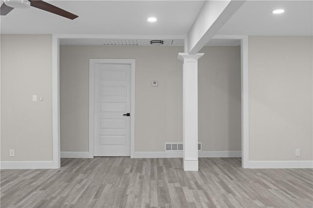 spare room featuring ceiling fan and light hardwood / wood-style floors