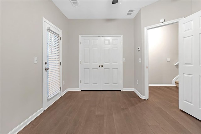 entrance foyer with hardwood / wood-style flooring and ceiling fan