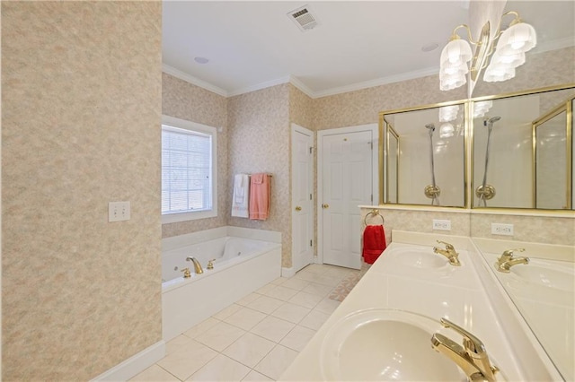 full bath with a sink, crown molding, and tile patterned flooring