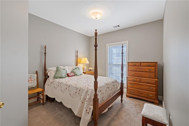 bedroom with carpet and visible vents