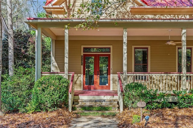 property entrance featuring ceiling fan, a porch, and french doors