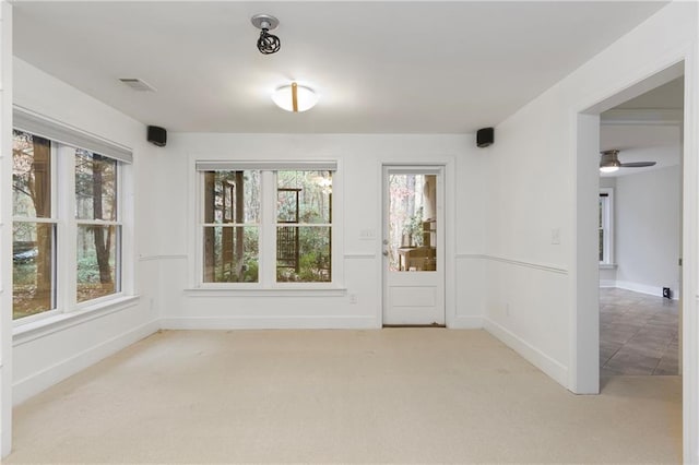 full bathroom with tile patterned flooring, shower / bath combination with curtain, vanity, and toilet