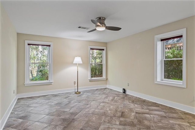 view of yard featuring ceiling fan