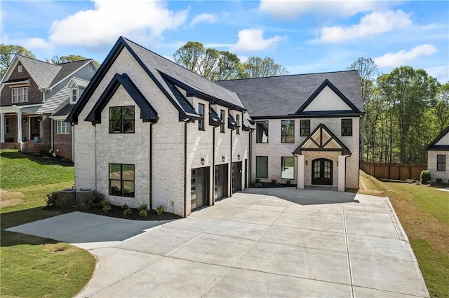 6238 Mount Salem Cir, Flowery Branch, GA 30542 - view of front of property with a garage, driveway, a front lawn, and brick siding