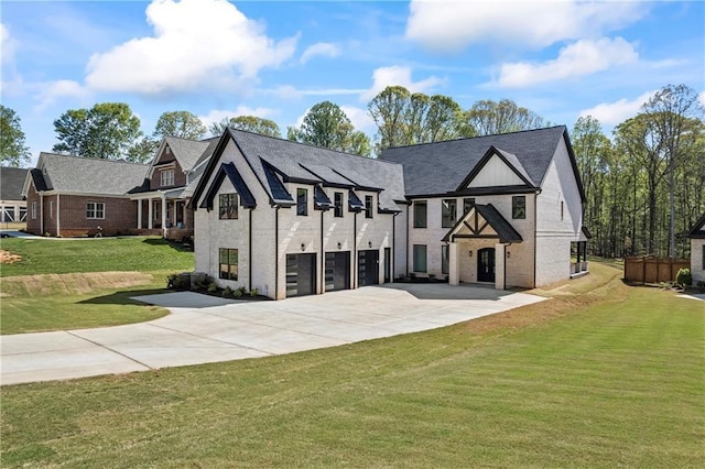 6238 Mount Salem Cir, Flowery Branch, GA 30542 - view of front of property with concrete driveway, a garage, a front lawn, and brick siding