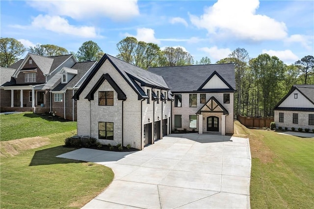 6238 Mount Salem Cir, Flowery Branch, GA 30542 - view of front of property featuring concrete driveway, an attached garage, a front lawn, and brick siding