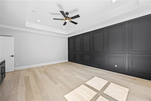 6238 Mount Salem Cir, Flowery Branch, GA 30542 - unfurnished living room featuring a raised ceiling, a ceiling fan, light wood-style floors, recessed lighting, and crown molding