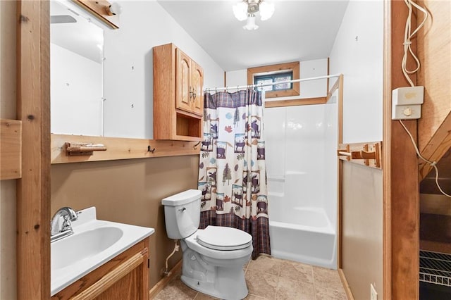 bathroom with shower / bathtub combination with curtain, vanity, and toilet