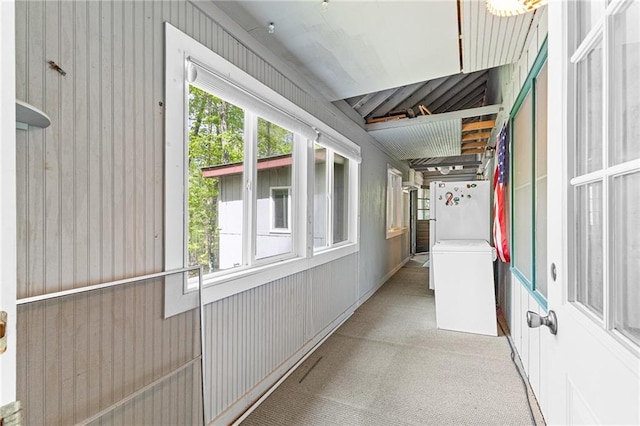 hall with carpet floors