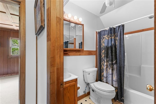 full bath featuring shower / bath combo, ceiling fan, baseboards, toilet, and vanity