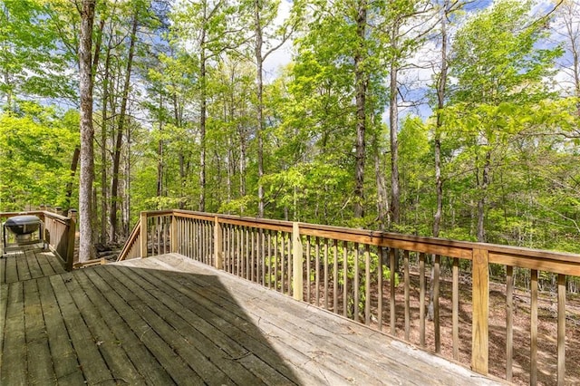 wooden deck with grilling area
