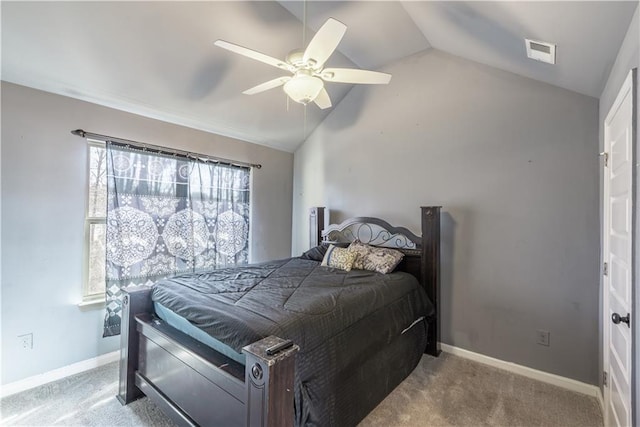 carpeted bedroom featuring vaulted ceiling and ceiling fan