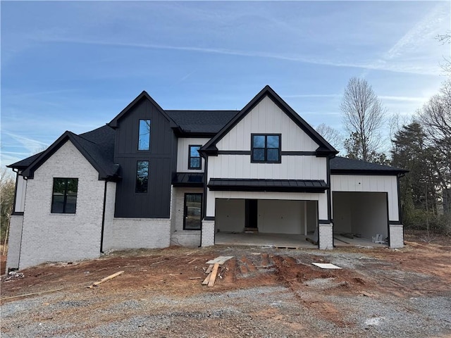 modern farmhouse with a garage