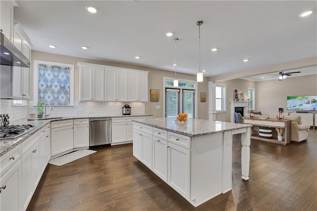 13015 Fox Rd, Alpharetta, GA 30005 - kitchen with stainless steel appliances, a kitchen island, backsplash, dark wood-type flooring, and recessed lighting