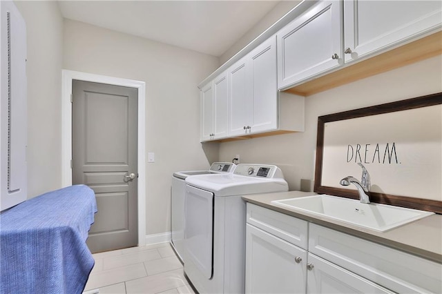 13015 Fox Rd, Alpharetta, GA 30005 - laundry room with separate washer and dryer, cabinet space, and light tile patterned flooring