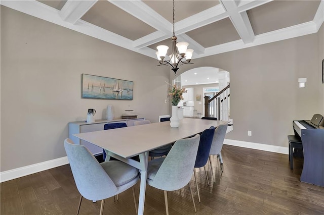 13015 Fox Rd, Alpharetta, GA 30005 - dining space featuring arched walkways, a chandelier, coffered ceiling, beamed ceiling, and dark wood-style flooring