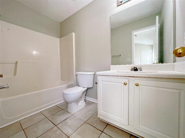 full bathroom with washtub / shower combination, a textured ceiling, tile patterned floors, toilet, and vanity