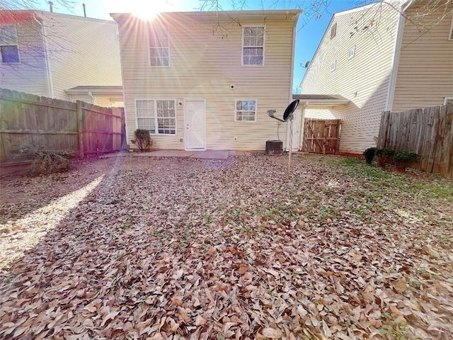 back of house with a patio