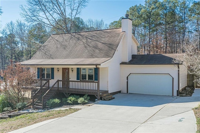 view of front facade featuring a garage and covered porch