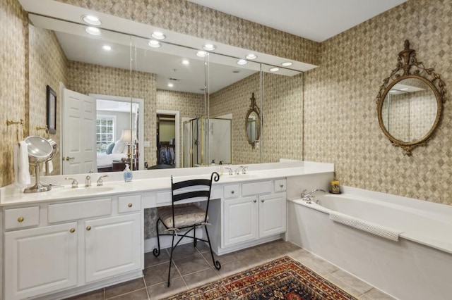 bathroom featuring vanity, separate shower and tub, and tile patterned flooring