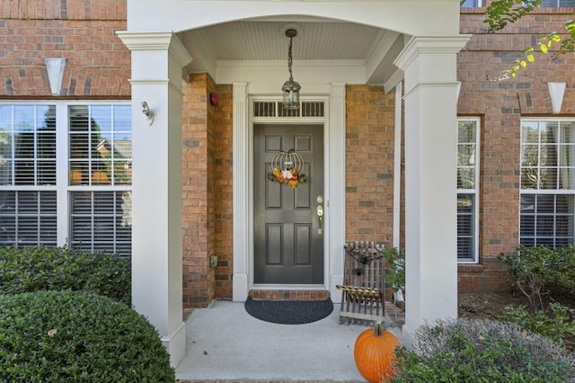 property entrance with covered porch