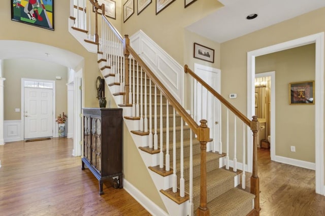 staircase featuring hardwood / wood-style floors