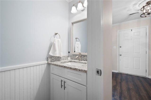 1223 Whitlock Ridge Dr SW, Marietta, GA 30064 - bathroom featuring ornamental molding, vanity, a chandelier, and wood finished floors
