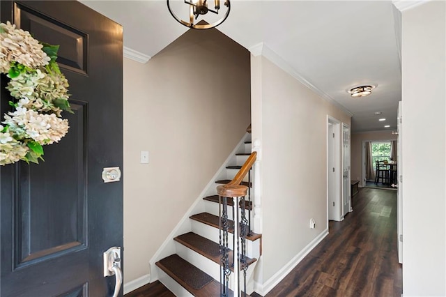 1223 Whitlock Ridge Dr SW, Marietta, GA 30064 - foyer entrance featuring stairway, wood finished floors, crown molding, and baseboards