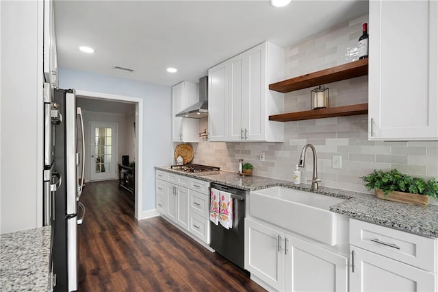 1223 Whitlock Ridge Dr SW, Marietta, GA 30064 - kitchen featuring appliances with stainless steel finishes, wall chimney range hood, a sink, open shelves, and white cabinetry