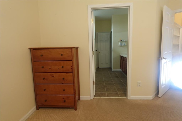 hallway featuring carpet