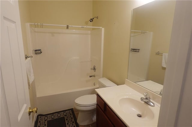 full bathroom with tile patterned floors,  shower combination, toilet, and vanity