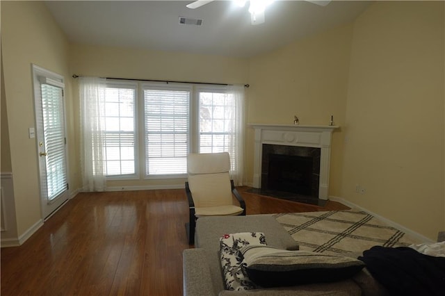 bedroom featuring ceiling fan and dark hardwood / wood-style flooring