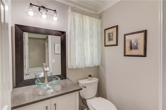 4246 Stilson Cir, Peachtree Corners, GA 30092 - half bathroom featuring vanity, toilet, and crown molding