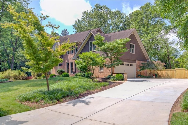 4246 Stilson Cir, Peachtree Corners, GA 30092 - view of front facade with a garage, concrete driveway, and brick siding