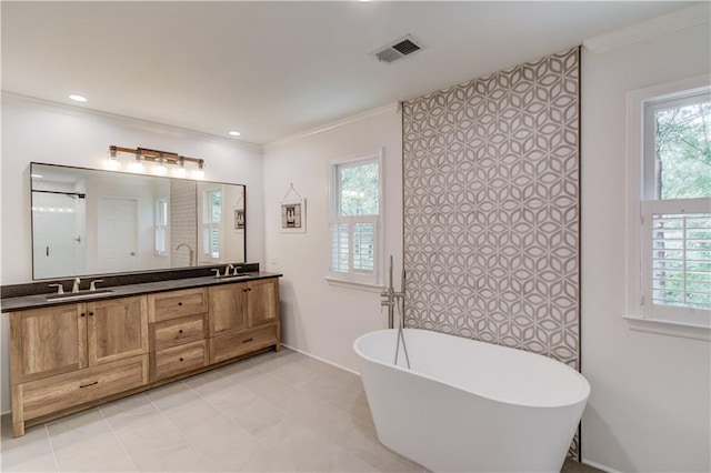 4246 Stilson Cir, Peachtree Corners, GA 30092 - full bath with a freestanding tub, double vanity, plenty of natural light, crown molding, and recessed lighting