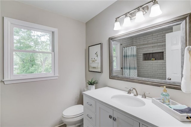 4246 Stilson Cir, Peachtree Corners, GA 30092 - bathroom with plenty of natural light, vanity, toilet, and a shower with curtain